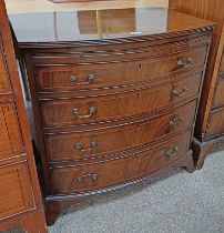 LATE 19TH CENTURY MAHOGANY BOW FRONT CHEST OF 4 DRAWERS WITH BRUSHING SLIDE ON BRACKET SUPPORTS.