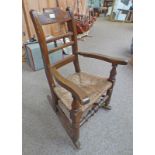MAHOGANY FRAMED CHILD'S ROCKING CHAIR WITH RUSHWORK SEAT