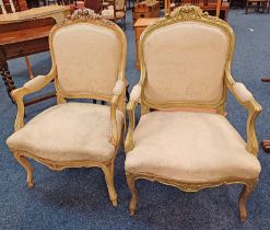 PAIR OF LATE 19TH CENTURY ARM CHAIRS WIHT SHAPED SUPPORTS AND DECORATIVE CARVED BACKS