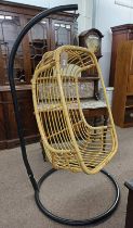 BAMBOO HANGING CHAIR ON METAL STAND WITH CIRCULAR BASE Condition Report: Both chair