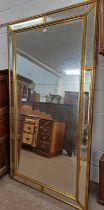 GILT FRAMED BEVELLED EDGE MIRROR WITH SMALL DECORATIVE MIRROR PANELS SURROUNDING CENTRAL PANEL -