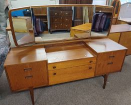 NATHAN TEAK DRESSING TABLE WITH MIRRORS OVER 2 CENTRALLY SET LONG DRAWERS FLANKED ON EACH SIDE BY 2