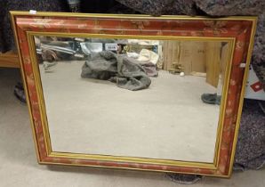 BEVELLED EDGED RECTANGULAR MIRROR WITH DECORATIVE FRAME.