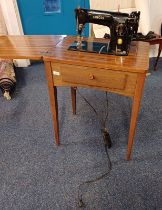 SINGER SEWING TABLE WITH FOLD OUT SEWING MACHINE.