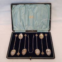 CASED SET OF 6 SILVER TEASPOONS & MATCHING SUGAR TONGS WITH THISTLE TERMINALS,
