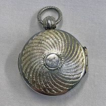 GEORGIAN SILVER CIRCULAR PENDANT VINAIGRETTE WITH SWIRLED DECORATION BY CORFIELD & CO,