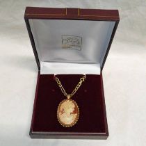 9CT GOLD CAMEO BROOCH PENDANT ON A 9CT GOLD CHAIN - 10.