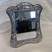 ART NOUVEAU STYLE SILVER FRAMED MIRROR EMBOSSED WITH STYLISED DAFFODILS,