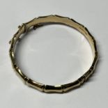 9CT GOLD BAMBOO EFFECT HINGED BANGLE - 5.7CM INNER DIAMETER, 9.