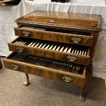 WALNUT 3 DRAWER CANTEEN OF SILVER PLATED CUTLERY WITH CROSS BANDED DECORATION ON SHAPED SUPPORTS