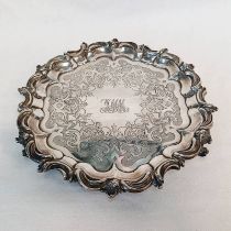 VICTORIAN SILVER SALVER WITH DECORATIVE SCROLL BORDER ON 3 SHAPED SUPPORTS BY A B SAVORY,