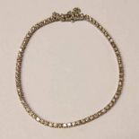 18CT GOLD DIAMOND SET LINE BRACELET THE BRILLIANT CUT DIAMOND APPROX 2.