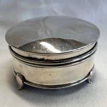 SILVER CIRCULAR JEWELLERY BOX ON 3 SHAPED FEET,