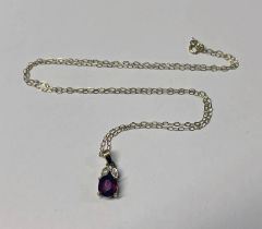 14K GOLD RUBY & DIAMOND PENDANT ON A FINE GOLD CHAIN