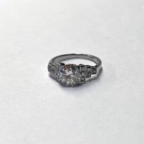 ART DECO PLATINUM DIAMOND SOLITAIRE RING WITH DIAMOND SET SHOULDERS, THE PRINCIPAL DIAMOND APPROX.