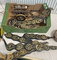 SELECTION OF VARIOUS HORSE BRASSES ON LEATHER AND A MODEL OF A WAGON