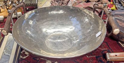 LARGE METAL BOWL WITH ANTLER SHAPED HANDLES,