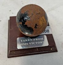 CANNON BALL ON STAND MARKED "TAKEN FROM HMS VICTORY"