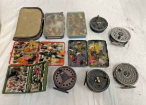 SELECTION OF VARIOUS FLYS IN FLY BOXES ALONG WITH REELS TO INCLUDE OKUMA 380 NES WITH SPARE SPOOL,