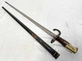 FRENCH GRAS BAYONET WITH 52CM LONG BLADE DATE 1879 TO SPINE OF BLADE WITH ITS STEEL SCABBARD