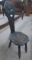 EARLY 20TH CENTURY EBONISED SPINNING CHAIR WITH CARVED DECORATION ON TURNED SUPPORTS STAMPED L S