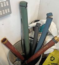 TWO EMPTY HARDY ROD TUBES AND TWO OTHERS ALONG WITH NETS.