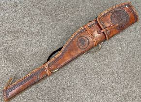 LEATHER GUN CASE, HEAVILY WORKED IN A AZTEC / NATIVE AMERICAN STYLE WITH GREEN FELT INTERIOR,