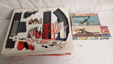 TWO UNMADE PLASTIC MODEL KITS FROM REVELL & ITALERI OF HMS HOOD & JUNKERS JU-87G-2 AND TCR ELECTRIC