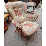 ERCOL ELM SPINDLE BACK ARMCHAIR WITH BUTTONED CUSHIONS Condition Report: The lot has