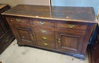 18TH/19TH CENTURY OAK DRESSER WITH 3 CENTRALLY SET DRAWERS FLANKED BY 2 PANEL DOORS WITH 3 DRAWERS