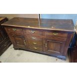 18TH/19TH CENTURY OAK DRESSER WITH 3 CENTRALLY SET DRAWERS FLANKED BY 2 PANEL DOORS WITH 3 DRAWERS