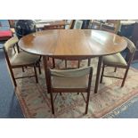 MCINTOSH EXTENDING DINING TABLE WITH FOLD-OUT LEAF & SET OF 4 MCINTOSH TEAK DINING CHAIRS.