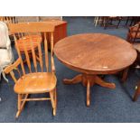 OAK SPAR BACK ROCKING CHAIR & OAK CIRCULAR PEDESTAL KITCHEN TABLE.