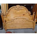 PINE BEDFRAME, THE HEADBOARD SURMOUNTED BY CARVED THISTLE DECORATION. WITH LATER ALTERATIONS.