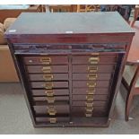 METAL FILING CABINET WITH TAMBOUR FRONT OPENING TO MULTI-DRAWER INTERIOR,