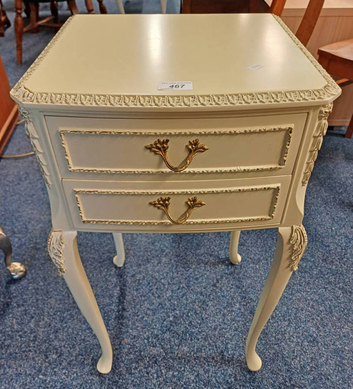 WHITE & GILT 2 DRAWER BEDSIDE TABLE ON SHAPED SUPPORTS.