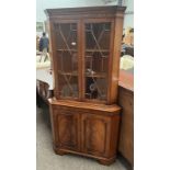 MAHOGANY CORNER CABINET WITH 2 ASTRAGAL GLASS PANEL DOORS OVER 2 PANEL DOORS ON BRACKET SUPPORTS