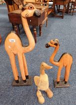 2 CARVED WOODEN CAMELS AND CARVED WOODEN DUCK
