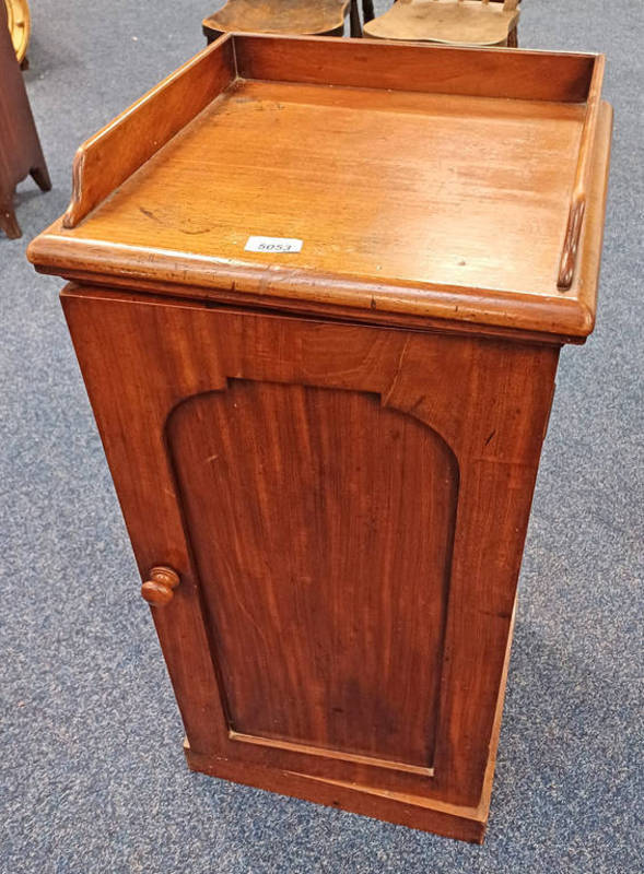 19TH CENTURY MAHOGANY CABINET WITH GALLERY TOP OVER SINGLE PANEL DOOR ON PLINTH BASE,