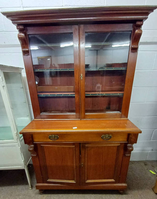 LATE 19TH CENTURY MAHOGANY BOOKCASE WITH 2 GLAZED DOORS OVER DRAWER OVER 2 PANEL DOORS ON TURNED