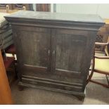19TH CENTURY OAK CABINET WITH 2 PANEL DOORS OPENING TO SHELVED INTERIOR OVER SINGLE DRAWER ON