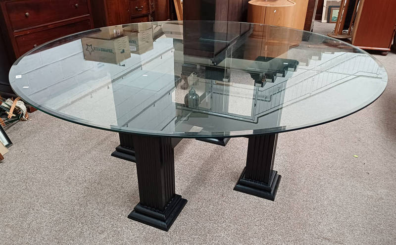 LARGE GLASS TOPPED CIRCULAR TABLE ON PAINTED BASE WITH 4 REEDED SQUARE COLUMNS ON PLINTH BASES.