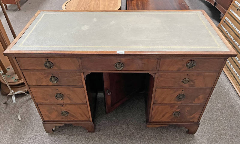 19TH CENTURY MAHOGANY KNEE HOLE DESK WITH LEATHER INSET TOP,