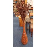 EASTERN HARDWOOD VASE AND CONTENTS OF FAUX FLOWERS