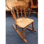 CHILD'S ELM SPINDLE BACK ROCKING CHAIR