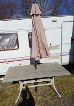 HARDSTONE TOPPED RECTANGULAR GARDEN TABLE ON METAL SUPPORTS & PARASOL.