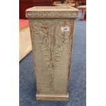PAINTED STICK STAND WITH CARVED FLORAL DECORATION IN THE ARTS & CRAFTS STYLE,