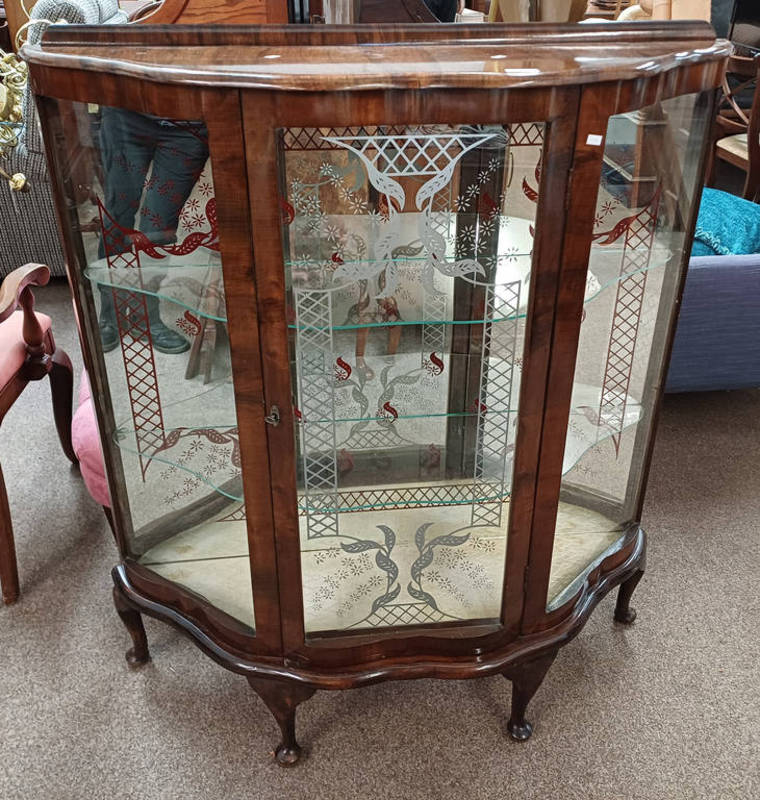 DISPLAY CABINET WITH SINGLE GLAZED PANEL DOOR OPENING TO GLASS SHELVED INTERIOR ON SHORT QUEEN ANNE