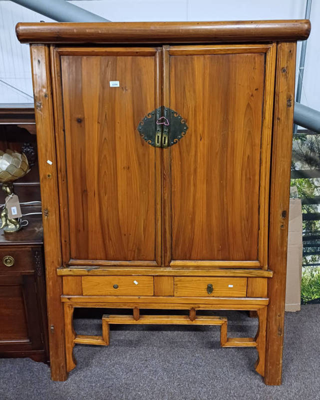 ORIENTAL CABINET WITH 2 PANEL DOORS OPENING TO SHELVED INTERIOR.