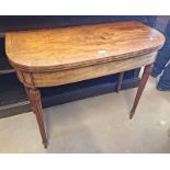 19TH CENTURY INLAID MAHOGANY CARD TABLE WITH FLIP - UP TOP ON REEDED SUPPORTS.